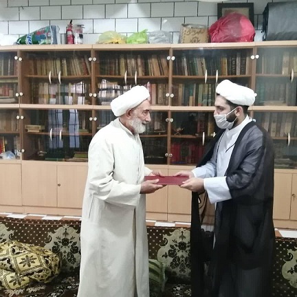 تجلیل رئيس اداره تبليغات اسلامي شوش از مبلّغ پیشکسوت این شهرستان